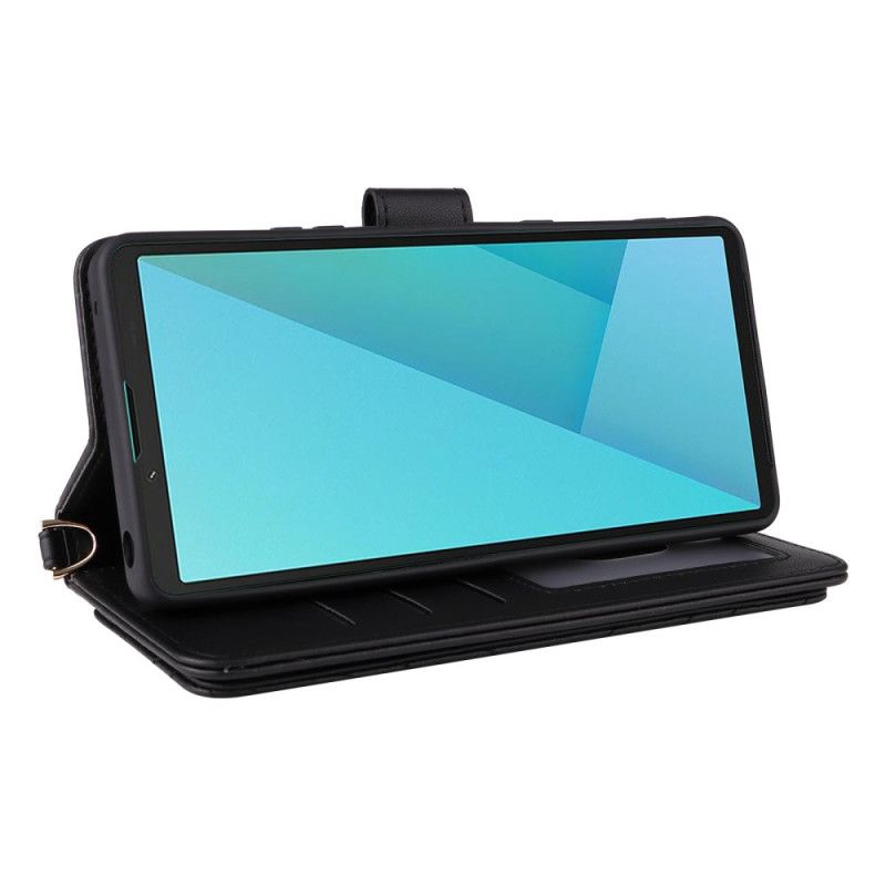 Läderskal Fodral Sony Xperia 10 Vii Quiltad Med Rem Och Handledsrem